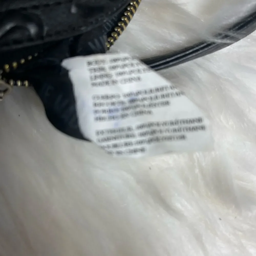Steve Madden black logo dome crossbody bag with gold tone chain accent